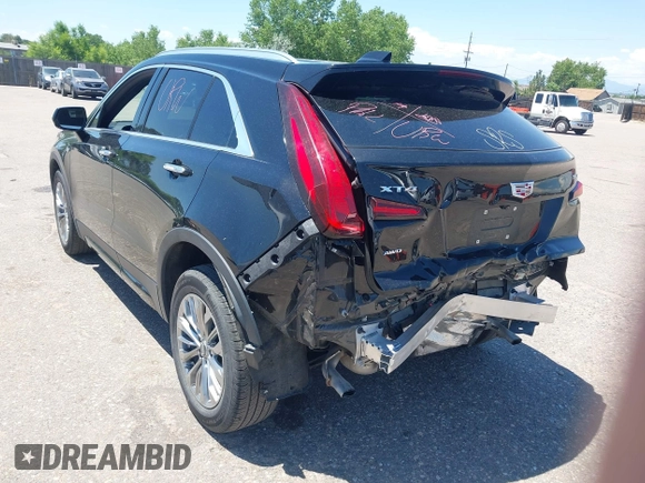 2024 Cadillac XT4 AWD Premium Luxury z VIN 1GYFZDR44RF144801, wystawiony jako IAAI lot #42646613 z przebiegiem 37 358 mil mil oraz . Historia ofert i sprzedaży dostępna na DreamBid. Obrazek 3.