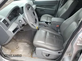 2005 Jeep Grand Cherokee Laredo with VIN 1J4GR48KX5C565762, listed as a Copart auction lot 63080115 with 122,349 mi miles and Salvage title. Bid and sale history available at DreamBid. Image 7.