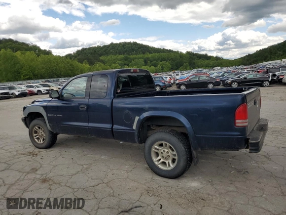 2002 Dodge Dakota z VIN 1B7GG32X32S546515, wystawiony jako Copart lot #57888695 z przebiegiem 81 202 mil mil oraz Szkoda całkowita • Salvage title. Historia ofert i sprzedaży dostępna na DreamBid. Obrazek 2.