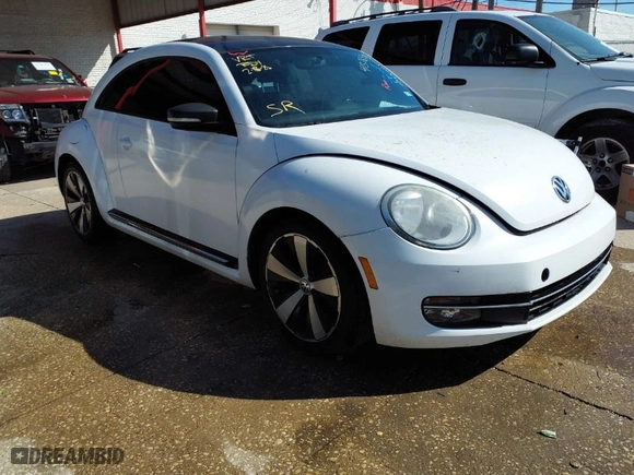2012 Volkswagen Beetle 2.0T Turbo PZEV with VIN 3VW4A7AT6CM648540, listed as a IAAI auction lot 41326503 with 118,929 mi miles. Bid and sale history available at carsss.com. Image 1.
