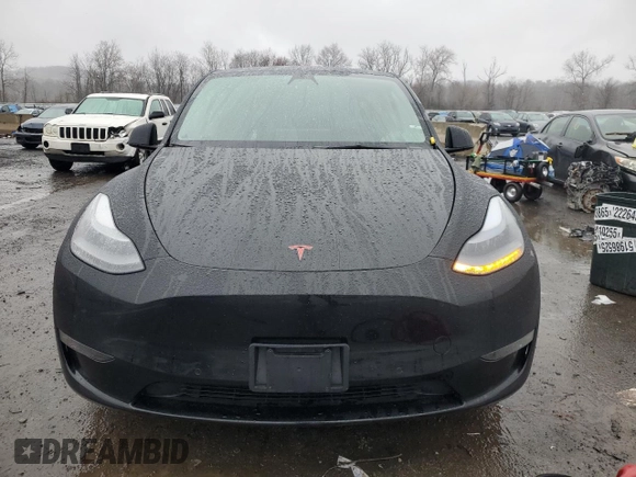 2022 Tesla Model Y Performance z VIN 7SAYGDEF9NF382883, wystawiony jako Copart lot #52028085 z przebiegiem 49 108 mil mil oraz Szkoda całkowita • Salvage title. Historia ofert i sprzedaży dostępna na DreamBid. Obrazek 5.