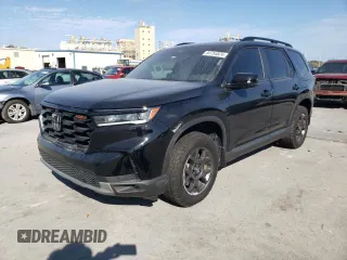 2023 Honda Pilot TrailSport with VIN 5FNYG1H66PB058087, listed as a Copart auction lot 84754824 with 26,278 mi miles and Salvage Title. Bid and sale history available at carsss.com. Image 1.