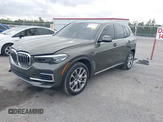 2022 BMW X5 xDrive45e z VIN 5UXTA6C00N9L06383, wystawiony jako IAAI lot #38552162 z przebiegiem 19 592 mil mil oraz . Historia ofert i sprzedaży dostępna na DreamBid. Obrazek 17.
