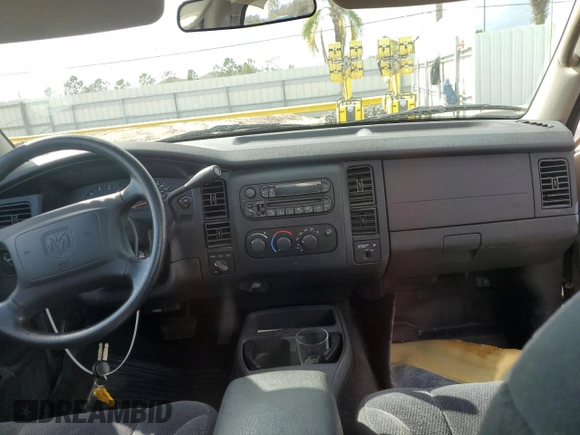 2004 Dodge Dakota with VIN 1D7GG16K94S622234, listed as a Copart auction lot 79830354 with 63,401 mi miles and Salvage Title. Bid and sale history available at DreamBid. Image 8.