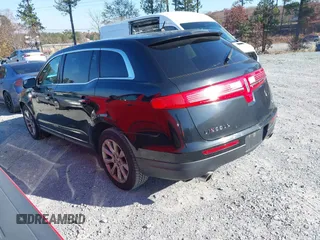 2013 Lincoln MKT with VIN 2LMHJ5FK9DBL56134, listed as a IAAI auction lot 41003176 with 292,292 mi miles and . Bid and sale history available at DreamBid. Image 3.