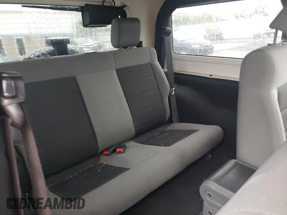 2009 Jeep Wrangler X with VIN 1J4FA24109L712701, listed as a Copart auction lot 60800855 with 156,709 mi miles and Salvage title. Bid and sale history available at DreamBid. Image 10.