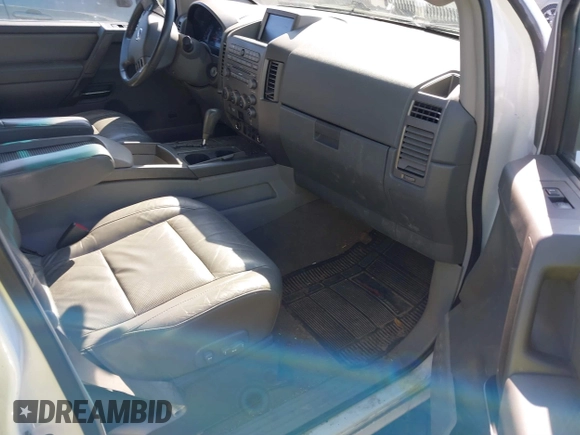 2004 Nissan Armada LE z VIN 5N1AA08BX4N731563, wystawiony jako IAAI lot #41790387 z przebiegiem 228 459 mil mil oraz . Historia ofert i sprzedaży dostępna na DreamBid. Obrazek 5.