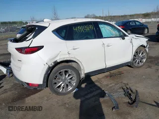 2020 Mazda CX-5 Grand Touring with VIN JM3KFBDM6L0751471, listed as a IAAI auction lot 41914849 with Not Provided miles and . Bid and sale history available at carsss.com. Image 4.