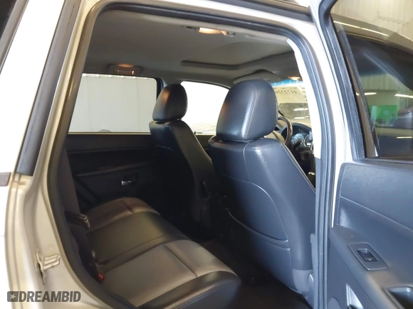 2010 Jeep Grand Cherokee Laredo with VIN 1J4RR4GT9AC106381, listed as a IAAI auction lot 41723268 with 180,008 mi miles. Bid and sale history available at carsss.com. Image 8.