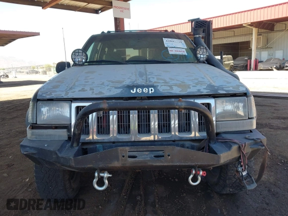 1994 Jeep Grand Cherokee Laredo with VIN 1J4GZ58S4RC280650, listed as a IAAI auction lot 42041261 with 199,265 mi miles and . Bid and sale history available at DreamBid. Image 6.