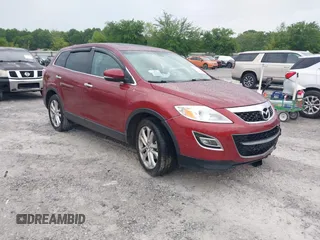 2012 Mazda CX-9 Grand Touring z VIN JM3TB2DA8C0350347, wystawiony jako IAAI lot #42214763 z przebiegiem 281 114 mil mil oraz . Historia ofert i sprzedaży dostępna na DreamBid. Obrazek 1.