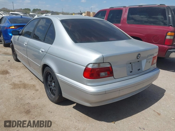 2003 BMW 5 Series 530iA with VIN WBADT63443CK38704, listed as a IAAI auction lot 41779122 with 103,198 mi miles. Bid and sale history available at carsss.com. Image 3.