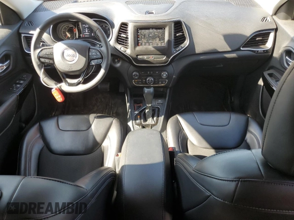 2020 Jeep Cherokee Altitude with VIN 1C4PJLLB1LD573710, listed as a Copart auction lot 57703275 with 124,016 mi miles and Salvage title. Bid and sale history available at DreamBid. Image 8.