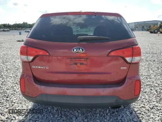 2014 Kia Sorento LX z VIN 5XYKT3A67EG461489, wystawiony jako Copart lot #57498295 z przebiegiem 198 799 mil mil oraz Szkoda całkowita • Salvage title. Historia ofert i sprzedaży dostępna na DreamBid. Obrazek 6.