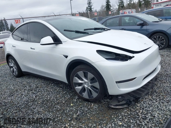 2023 Tesla Model Y Long Range with VIN 7SAYGDEE7PF809164, listed as a IAAI auction lot 41828974 with 31,772 mi miles. Bid and sale history available at carsss.com. Image 1.