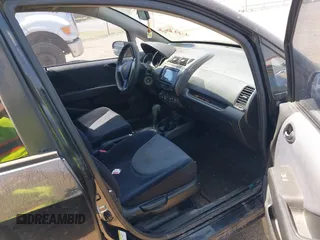 2007 Honda Fit with VIN JHMGD38447S027758, listed as a IAAI auction lot 42015742 with 201,611 mi miles. Bid and sale history available at carsss.com. Image 5.