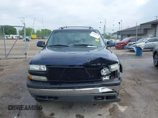 2005 Chevrolet Tahoe LS z VIN 1GNEK13T75J104358, wystawiony jako IAAI lot #42456378 z przebiegiem 213 558 mil mil oraz . Historia ofert i sprzedaży dostępna na DreamBid. Obrazek 12.