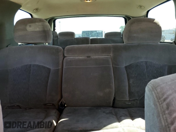 2002 Chevrolet Tahoe LS z VIN 1GNEC13T42R256432, wystawiony jako Copart lot #51706375 z przebiegiem 193 298 mil mil oraz Szkoda całkowita • Salvage title. Historia ofert i sprzedaży dostępna na DreamBid. Obrazek 10.
