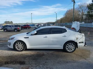 2015 Kia Optima EX with VIN 5XXGN4A77FG437245, listed as a IAAI auction lot 41560539 with 196,480 mi miles and . Bid and sale history available at DreamBid. Image 15.