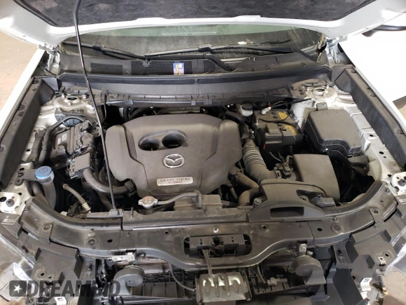2023 Mazda CX-9 Touring Plus with VIN JM3TCBAY4P0653310, listed as a Copart auction lot 42734995 with 18,236 mi miles and Salvage title. Bid and sale history available at DreamBid. Image 12.