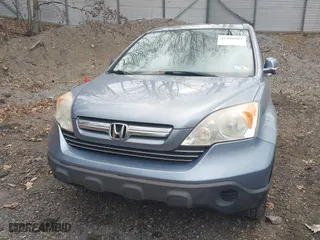 2009 Honda CR-V EX-L with VIN JHLRE48719C007622, listed as a IAAI auction lot 41999801 with 158,976 mi miles. Bid and sale history available at carsss.com. Image 20.