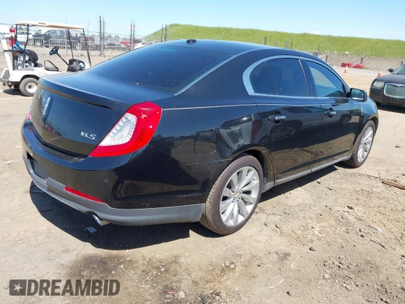 2014 Lincoln MKS with VIN 1LNHL9DK0EG600330, listed as a IAAI auction lot 41953968 with 228,668 mi miles. Bid and sale history available at carsss.com. Image 4.