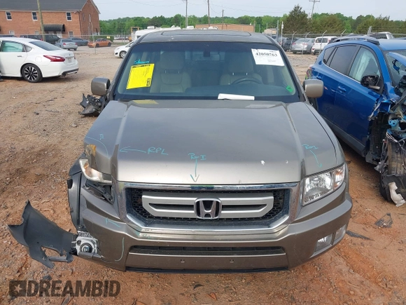 2010 Honda Ridgeline RTL with VIN 5FPYK1F50AB003576, listed as a IAAI auction lot 42050763 with 183,197 mi miles. Bid and sale history available at carsss.com. Image 12.