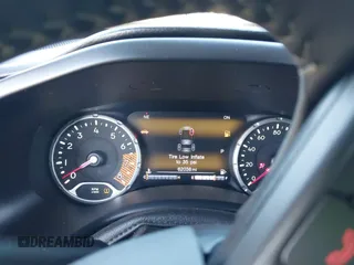 2021 Jeep Renegade Latitude z VIN ZACNJDBB2MPM79995, wystawiony jako IAAI lot #42009880 z przebiegiem 62 038 mil mil oraz . Historia ofert i sprzedaży dostępna na DreamBid. Obrazek 15.