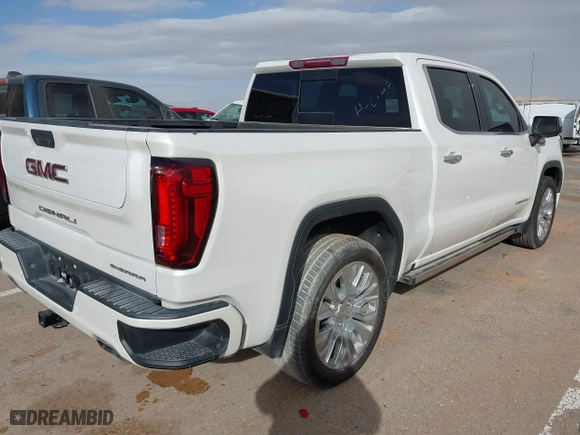 2022 GMC Sierra 1500 Limited Denali with VIN 3GTU9FEL1NG173980, listed as a IAAI auction lot 41569082 with 26,880 mi miles. Bid and sale history available at carsss.com. Image 4.
