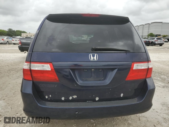 2007 Honda Odyssey LX with VIN 5FNRL382X7B054326, listed as a Copart auction lot 58912205 with 168,994 mi miles and Clean title. Bid and sale history available at DreamBid. Image 6.