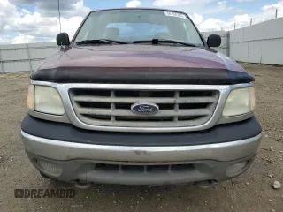 2003 Ford F-150 XL z VIN 2FTPX18LX3CA36886, wystawiony jako Copart lot #58194385 z przebiegiem 302 328 mil mil oraz Czysty tytuł • Clean title. Historia ofert i sprzedaży dostępna na DreamBid. Obrazek 5.
