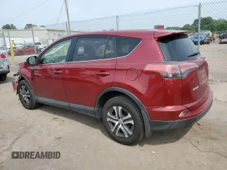 2018 Toyota RAV4 LE with VIN JTMBFREV2JD233808, listed as a Copart auction lot 59021235 with 71,430 mi miles and Salvage title. Bid and sale history available at DreamBid. Image 2.