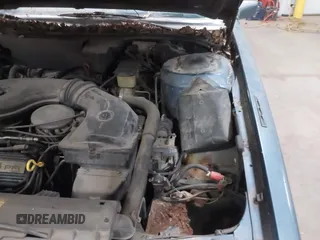 1990 Cadillac DeVille z VIN 1G6CD5331L4293427, wystawiony jako IAAI lot #41764635 z przebiegiem 198 499 mil mil oraz . Historia ofert i sprzedaży dostępna na DreamBid. Obrazek 12.