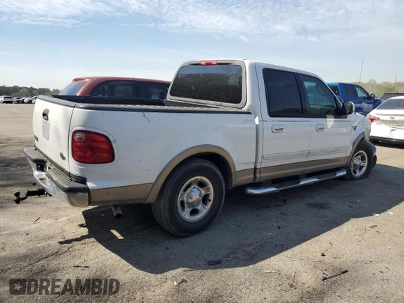 2002 Ford F-150 XLT with VIN 1FTRW07L32KE29159, listed as a Copart auction lot 50596125 with 198,058 mi miles and Salvage Title. Bid and sale history available at carsss.com. Image 3.
