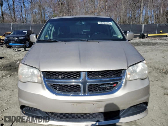 2013 Dodge Grand Caravan SXT with VIN 2C4RDGCG5DR635014, listed as a Copart auction lot 49552925 with 194,929 mi miles and Clean Title. Bid and sale history available at DreamBid. Image 5.
