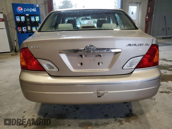 2000 Toyota Avalon XL with VIN 4T1BF28B1YU033159, listed as a Copart auction lot 52796755 with 247,062 mi miles and Salvage Title. Bid and sale history available at DreamBid. Image 6.