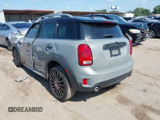 2020 MINI Countryman Cooper S with VIN WMZYW7C05L3M07661, listed as a IAAI auction lot 42242689 with 45,602 mi miles and . Bid and sale history available at DreamBid. Image 3.