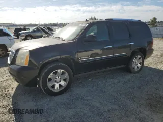 2007 GMC Yukon Denali z VIN 1GKFK63877J235917, wystawiony jako Copart lot #57445735 z przebiegiem 253 961 mil mil oraz Czysty tytuł • Clean title. Historia ofert i sprzedaży dostępna na DreamBid. Obrazek 1.