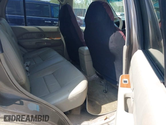 2001 Infiniti QX4 with VIN JNRDR09X11W201136, listed as a IAAI auction lot 41904963 with 198,345 mi miles and . Bid and sale history available at DreamBid. Image 8.
