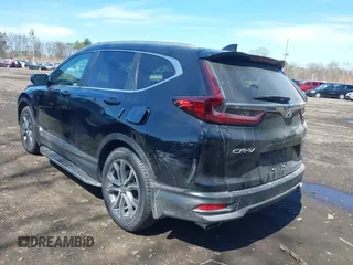 2020 Honda CR-V Touring with VIN 2HKRW2H98LH660573, listed as a IAAI auction lot 41524610 with 37,493 mi miles and . Bid and sale history available at DreamBid. Image 3.