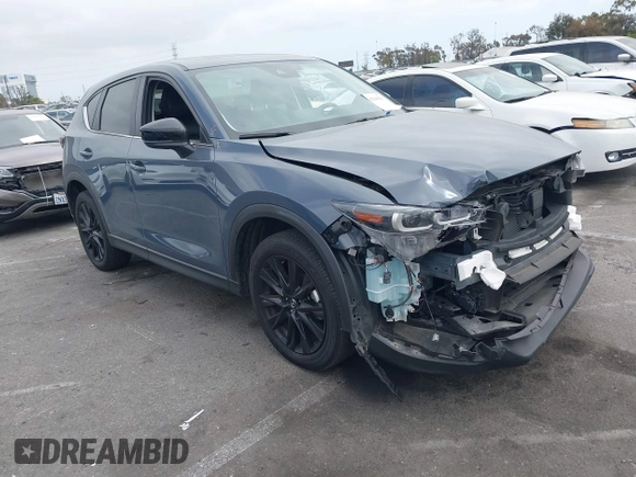 2024 Mazda CX-5 2.5 S Carbon Edition with VIN JM3KFBCL6R0482860, listed as a IAAI auction lot 42108547 with 30,802 mi miles. Bid and sale history available at carsss.com. Image 1.
