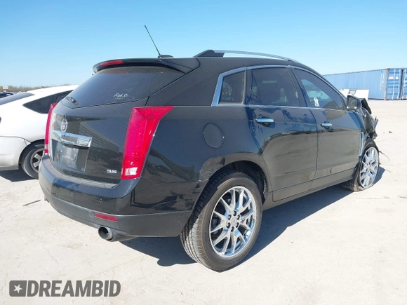 2015 Cadillac SRX Premium Collection with VIN 3GYFNDE33FS531081, listed as a IAAI auction lot 41763596 with 157,455 mi miles. Bid and sale history available at carsss.com. Image 4.