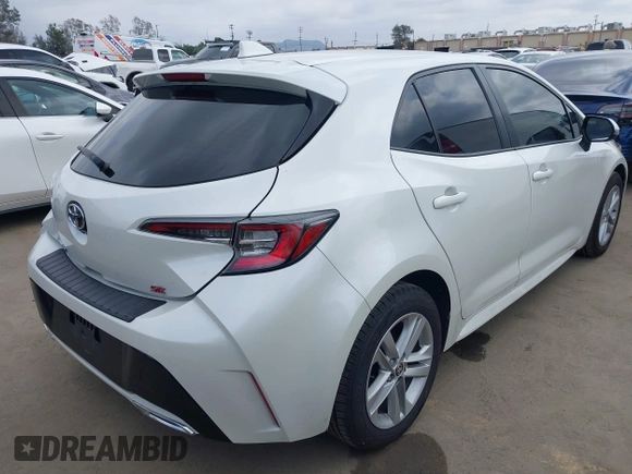 2020 Toyota Corolla Hatchback SE with VIN JTND4RBE3L3077866, listed as a IAAI auction lot 42078596 with 60,153 mi miles. Bid and sale history available at carsss.com. Image 4.