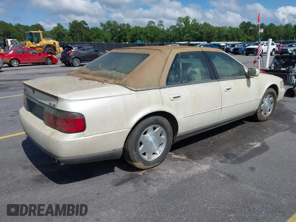 2001 Cadillac Seville Luxury SLS z VIN 1G6KS54Y81U110047, wystawiony jako IAAI lot #42436746 z przebiegiem 107 360 mil mil oraz . Historia ofert i sprzedaży dostępna na DreamBid. Obrazek 4.