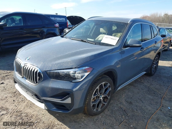 2021 BMW X1 xDrive28i with VIN WBXJG9C07M5T23053, listed as a IAAI auction lot 41774663 with 66,770 mi miles. Bid and sale history available at carsss.com. Image 17.