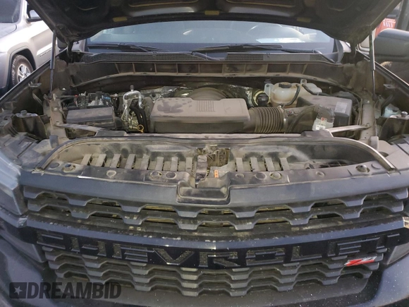 2021 Chevrolet Silverado 1500 Custom Trail Boss with VIN 3GCPYCEF6MG104130, listed as a Copart auction lot 82775624 with 62,408 mi miles and Salvage Title. Bid and sale history available at DreamBid. Image 11.