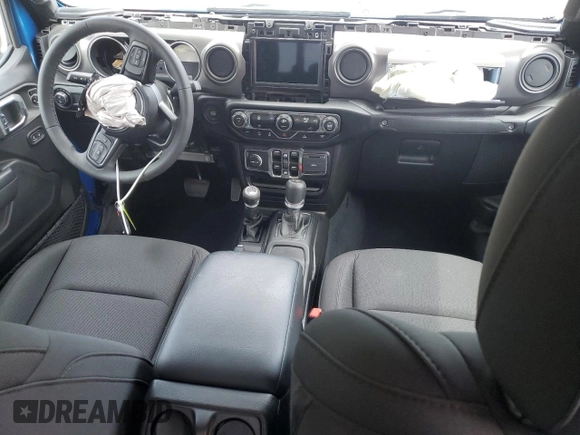 2023 Jeep Gladiator Sport S with VIN 1C6HJTAG3PL593284, listed as a Copart auction lot 57292935 with Not provided miles and Salvage title. Bid and sale history available at DreamBid. Image 8.