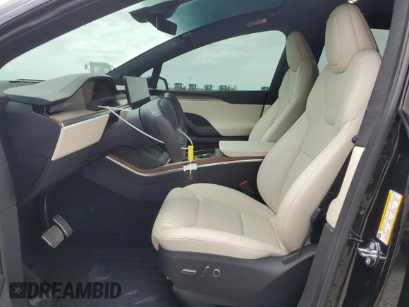 2022 Tesla Model X with VIN 7SAXCDE59NF360610, listed as a Copart auction lot 52575365 with 51,557 mi miles and Salvage Title. Bid and sale history available at carsss.com. Image 7.