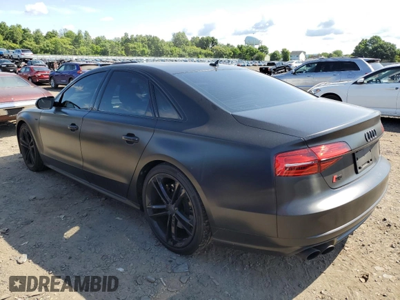 2015 Audi S8 z VIN WAUK2AFD3FN015524, wystawiony jako Copart lot #58506754 z przebiegiem 69 866 mil mil oraz Szkody całkowita. Historia ofert i sprzedaży dostępna na DreamBid. Obrazek 2.