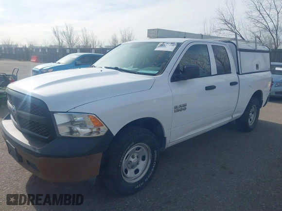 2015 Ram 1500 Tradesman with VIN 1C6RR7FG0FS747290, listed as a IAAI auction lot 41337350 with 176,175 mi miles and . Bid and sale history available at DreamBid. Image 2.